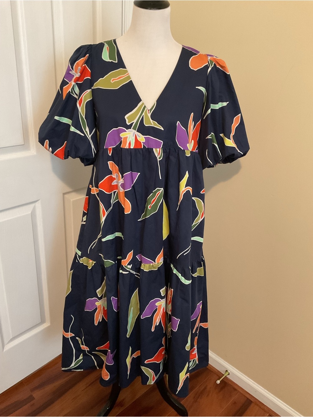 crosby. Navy Floral V-Neck Tiered Dress with Orange & Purple Accents